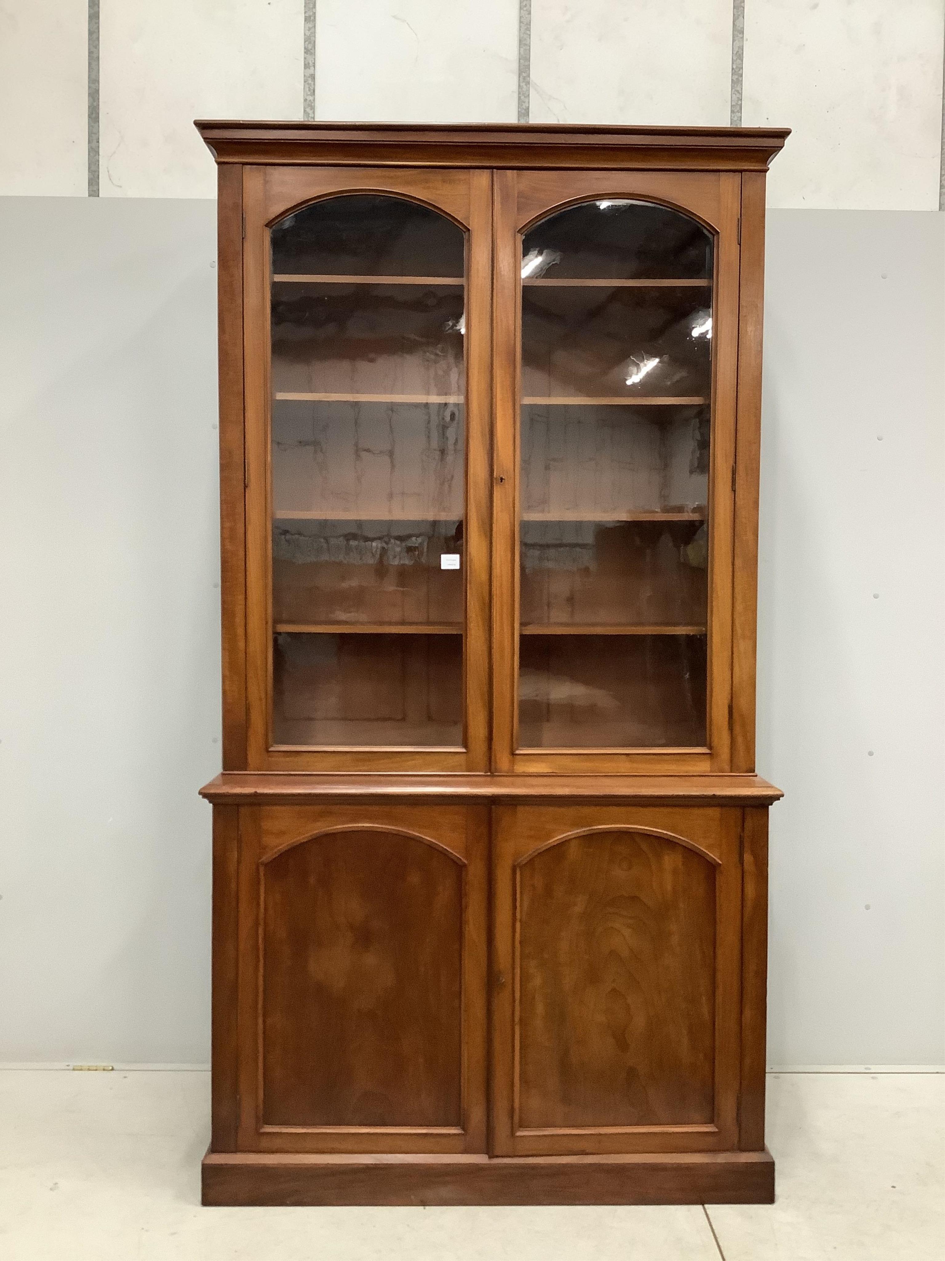 A Victorian mahogany library bookcase, width 127cm, depth 49cm, height 236cm. Condition - fair